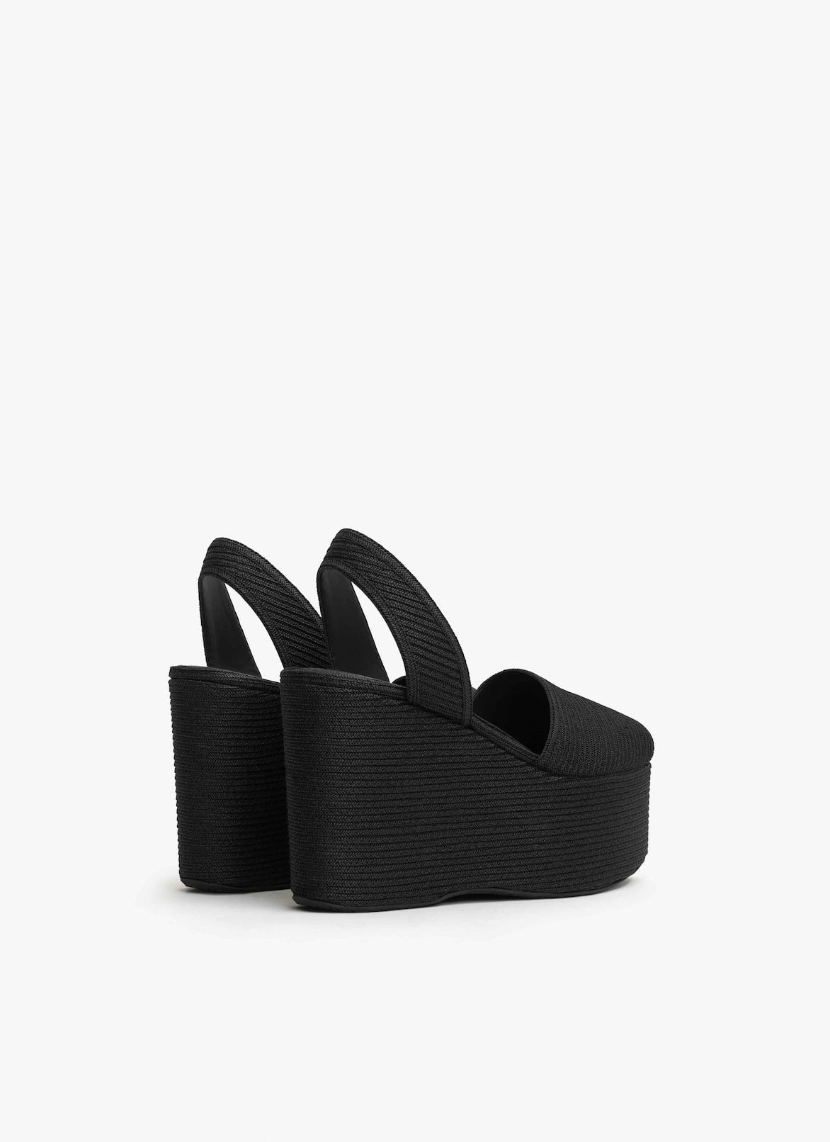 WEDGE SANDALS IN PAPER STRAW ALAÏA BLACK WEDGE SANDALS IN PAPER STRAW